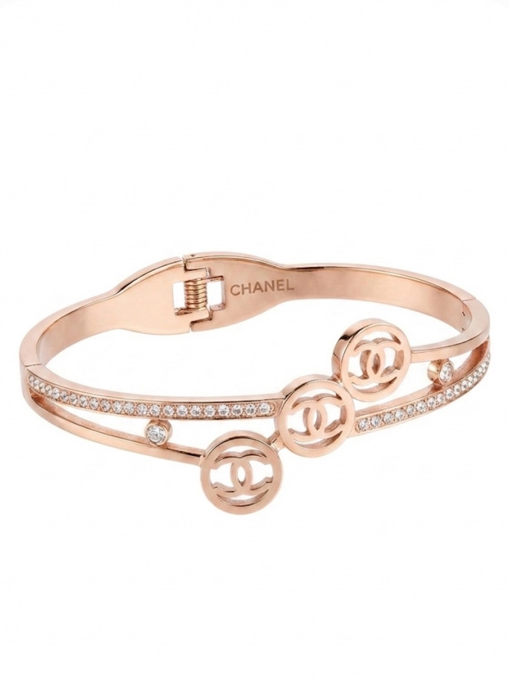 Rose gold-colored bangle w Interlocking “CC” design